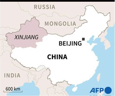 Deadly Xinjiang fire stirs anger at China's zero-Covid policy