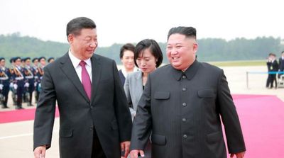 Xi Tells Kim China Willing to Work with N.Korea for 'World Peace'