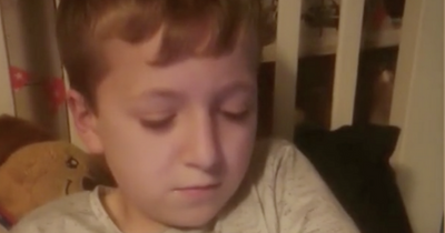 Youngster who has not seen grandad for three years watches video of him singing every night
