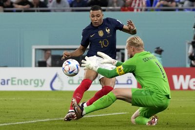 France into World Cup last 16 as Mbappe double sinks Denmark