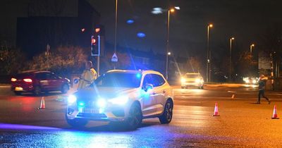 Police close section of busy road after two car crash