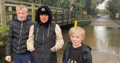 Crowds flock to a PUDDLE as families rush to visit unlikely tourist attraction