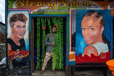 AP PHOTOS: Bright shops enliven Congo's dark days