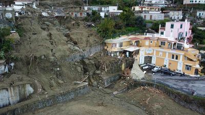 Italian rescuers search for missing in island landslide