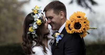 Ukrainian couple marry in UK surrounded by pictures of family who stayed behind