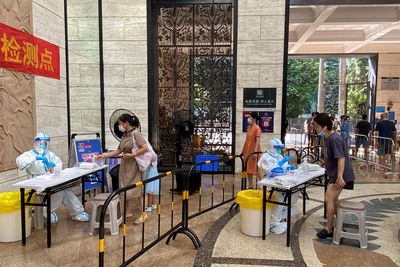 China's Shenzhen limits indoor venue occupancy, asks public to work from home