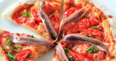 Woman in disbelief after date breaks up with her for putting anchovies on pizza