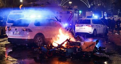 World Cup riot erupts as fans flip cars and set fires after Belgium vs Morocco match