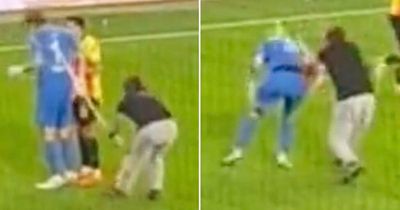 Goalkeeper viciously attacked with corner flag as bloodied fan taken to ambulance