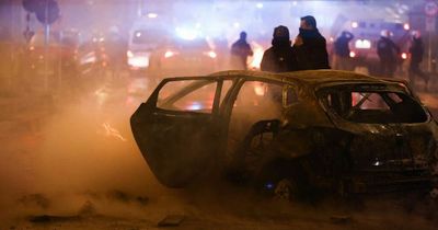 World Cup fans riot with 'police using water cannons and tear gas' as Morocco beat Belgium