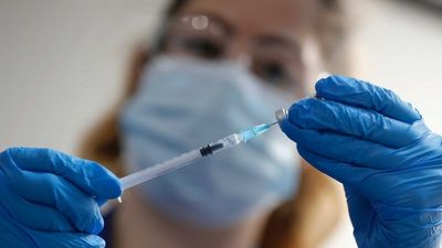 A new generation of COVID-19 vaccine, or running out of steam? Here's how experts see the pandemic ending