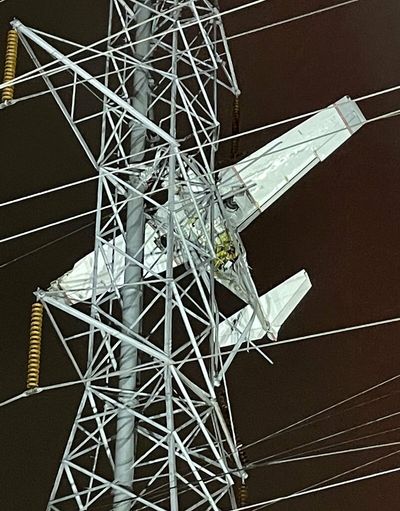 2 people are rescued from a plane that crashed into a Maryland transmission tower
