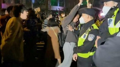 Police Detain Two People at Shanghai Protest Site