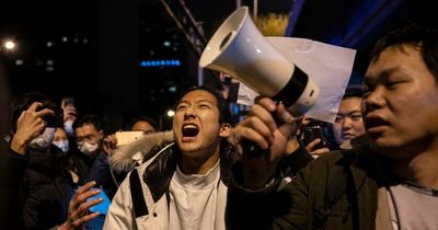 Anti-lockdown protests hit China cities as Brit journalist arrested and beaten