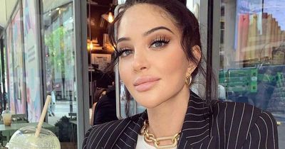 N-Dubz star Tulisa unrecognisable with ice blonde hair that's long enough to sit on