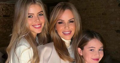 Amanda Holden beams beside look-a-like daughters in matching outfits on family day out