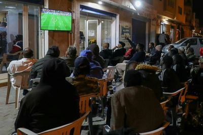 Libyans, divided by conflict, unite around football