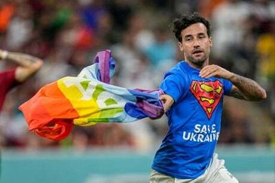 World Cup 2022 pitch invader wears ‘Save Ukraine’ shirt and holds pride flag during Portugal vs Uruguay