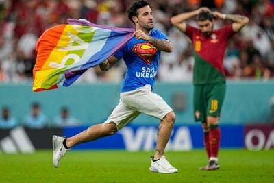 Portugal’s Ruben Neves urges World Cup authorities to be lenient on pride flag pitch invader