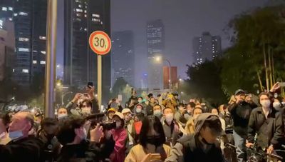 China moves to curb protests, some COVID measures adjusted