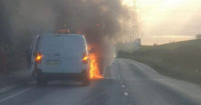 Bus bursts into flames on busy Scottish road as fire crews battle blaze for hours