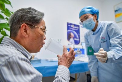 China says to accelerate push to vaccinate elderly against Covid-19