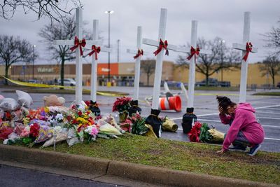 Walmart employee who survived Virginia mass shooting files $50m lawsuit