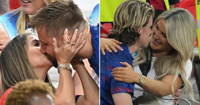 WAGs smooch England stars as they celebrate 3-0 Wales win as footballers jump into crowd