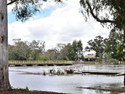 Teen's body found, flood cost hits $12b