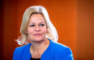 German police raid, question online hate speech suspects