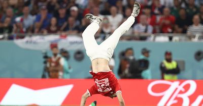 World Cup 2022 pitch invader cartwheels during political protest as France vs Tunisia halted