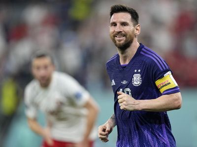 Lionel Messi and Argentina advance at the World Cup with a 2-0 victory over Poland