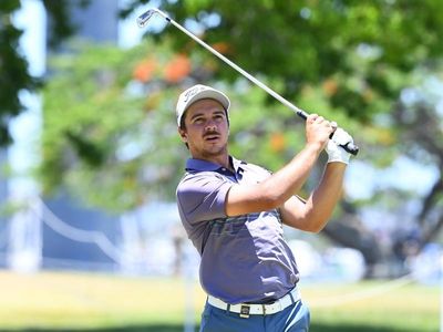 Peeved Micheluzzi leads Australian Open