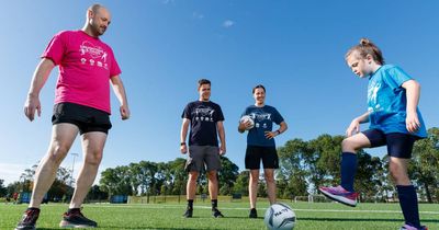 Daughters and Dads Football pilot program is kicking goals