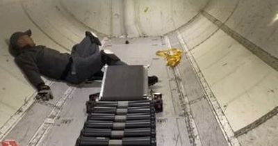 Baggage handler has people feeling 'claustrophobic' as he loads bags into plane hold
