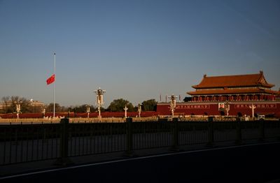 Former leader Jiang's body arrives in Beijing as China mourns
