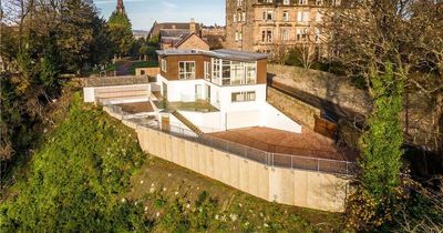 Secluded Edinburgh mansion on its own mini island hits the market with glass exteriors