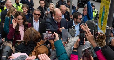 Prince William and Kate receive roaring welcome by US crowds and boy dressed as Palace guard