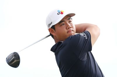 Bogey-free Tom Kim shares Hero World Challenge lead