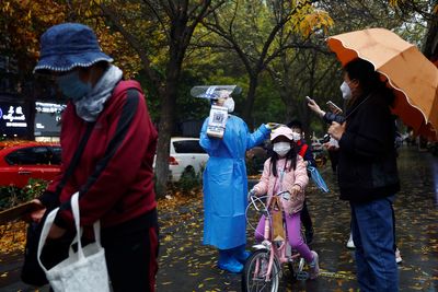 China reports 34,980 new COVID cases for Dec 1 vs 36,061 a day earlier