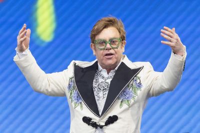 Elton John marks World Aids Day with charity message ‘no one left behind’