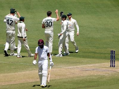 Cummins joins rare air with quick 200