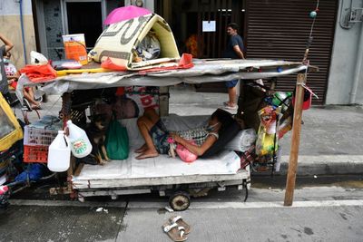 Street life: Manila's homeless find shelter in pushcarts