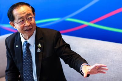 Finance minister defends tax on share sales