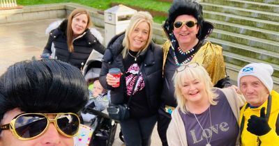 Ministers turn heads after strolling through shopping mall dressed as Elvis