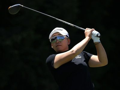 Shin surges clear of Australian Open pack