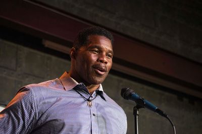 Obama mocks "werewolf" Herschel Walker