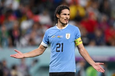 Furious Edinson Cavani knocks over VAR monitor after Uruguay denied penalty in World Cup 2022 exit