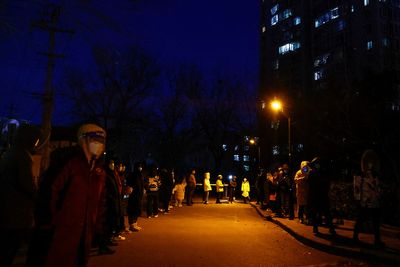 China's Xi unwilling to accept vaccines despite threat from protests, U.S. official says