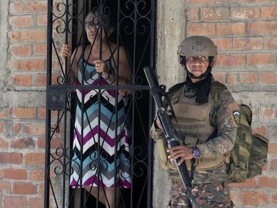 El Salvador has sent 10,000 police to seal off a town and search for gang members